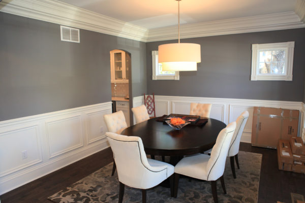 Dining Room with wainscoting and crown molding trim