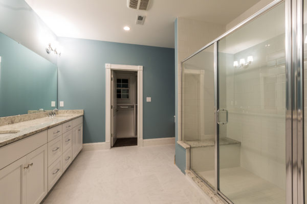 Oversized two headed Master shower and custom vanity in the Masterbathroom